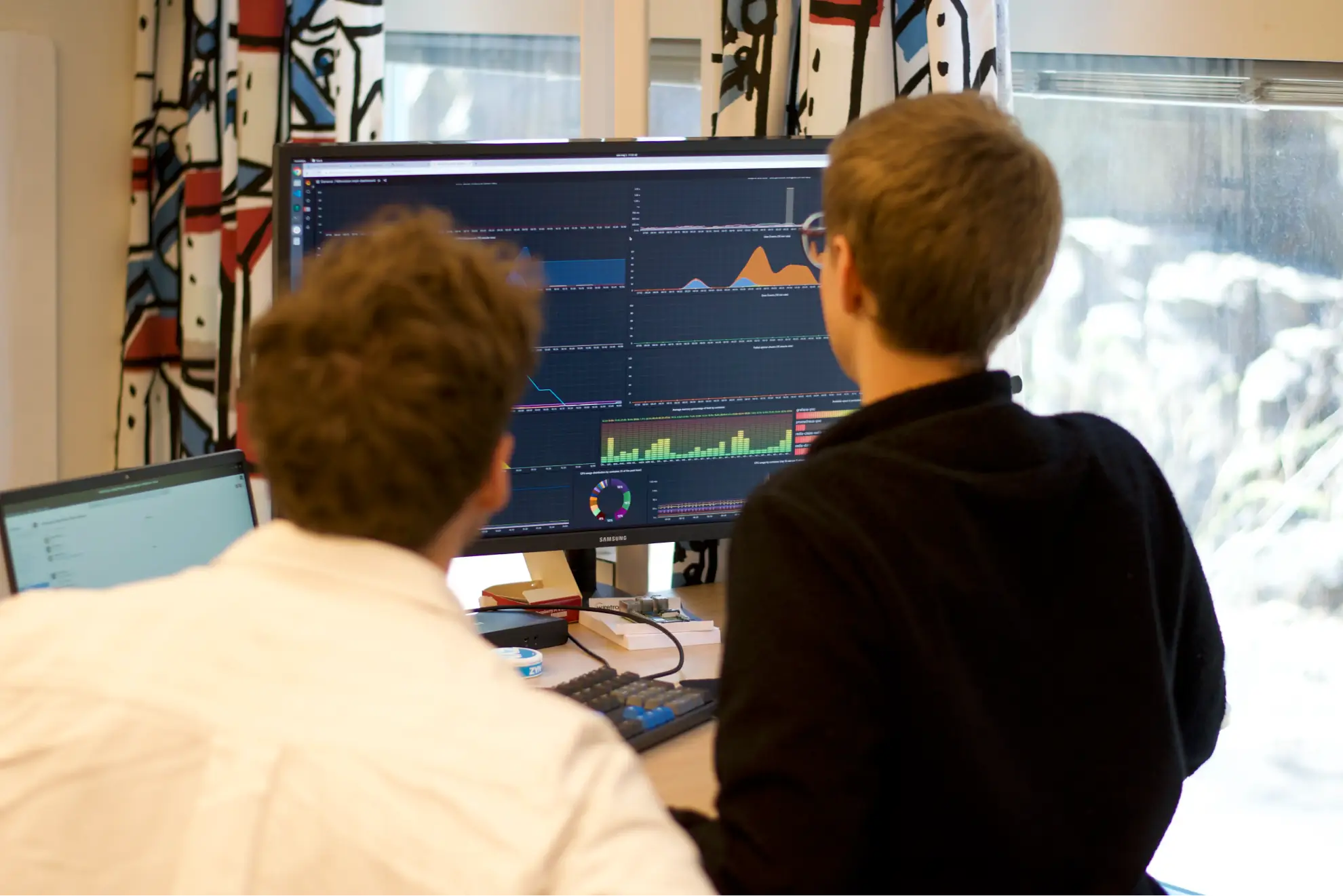 Engineers analysing data
